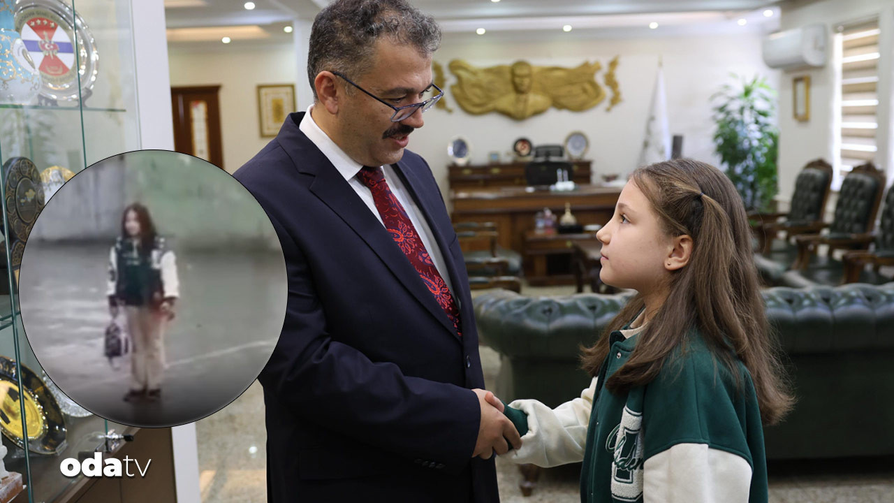 yagmur altinda istiklal marsi okuyan zeynep eceye validen odul kBsanNng.jpg